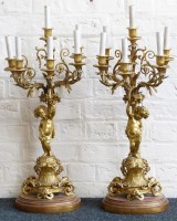 Lot 629 - Pair of gilt metal candelabras.