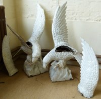 Lot 639 - Two cast iron eagles.
