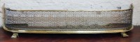 Lot 640 - Brass fender with fretted decoration.