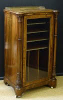 Lot 667 - Victorian walnut music cabinet.