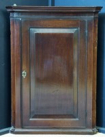 Lot 678 - 18th century mahogany corner cupboard c.1760.