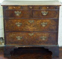 Lot 688 - Walnut chest of drawers.