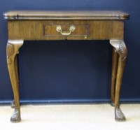 Lot 696 - Fold-over walnut card table.