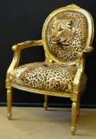 Lot 697 - Gilt frame elbow chair.