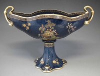 Lot 174 - Carlton ware twin handled vase.