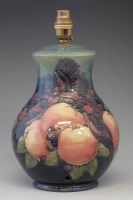 Lot 178 - Moorcroft lamp and shade.