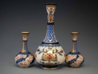 Lot 179 - Macintyre vase and a pair of vases.
