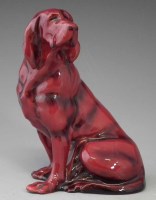 Lot 185 - Royal Doulton flambe Dog.