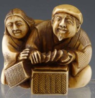 Lot 199 - Japanese ivory netsuke of two characters.