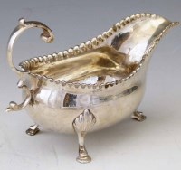 Lot 226 - George III silver sauce boat.