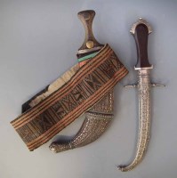 Lot 51 - Two Persian white metal Jambiyas.