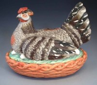 Lot 146 - Large Staffordshire hen dish.