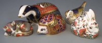 Lot 207 - Five Royal Crown Derby paperweights   to include
