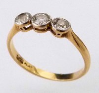 Lot 226 - Three stone old cut diamond ring.