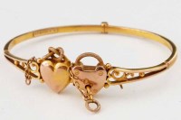 Lot 268 - Hinged 9ct gold bangle.