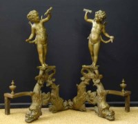 Lot 515 - Pair of brass androns.