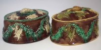 Lot 141 - Two majolica game pie dishes,   moulded with game
