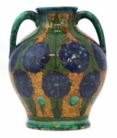Lot 217 - Della Robbia twin handled vase   painted with a