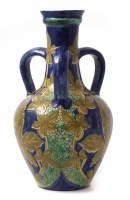 Lot 224 - Della Robbia three handled vase   incised by