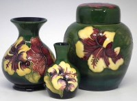 Lot 246 - Moorcroft ginger jar and cover and two vases