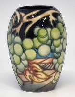Lot 253 - Moorcroft trial vase,   decorated with a version
