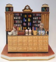 Lot 301 - Large Capo Di Monte chemists shop.