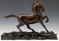 Lot 344 - Chinese bronze horse and stand.
