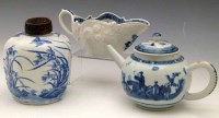 Lot 353 - Chinese sauceboat after a Bow original, also an octagonal vase, and a teapot