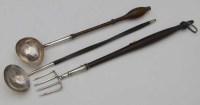 Lot 415 - Two George III silver toddy ladles and a toasting