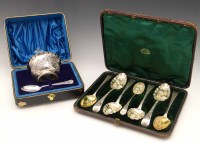 Lot 417 - Cased set of seven Georgian silver berry spoons and a cased bowl and spoon