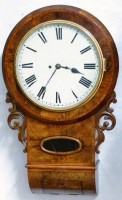 Lot 699 - Walnut wall clock.