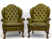 Lot 723 - Pair of wing-back chairs.