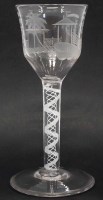 Lot 112 - Wine glass with figures.