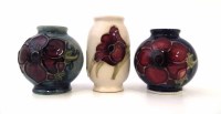 Lot 250 - Three Moorcroft miniature vases.