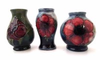 Lot 252 - Three Moorcroft miniature vases.