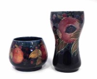 Lot 254 - Two Moorcroft ommegranate vases.