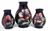 Lot 259 - Three Moorcroft Anemone vases