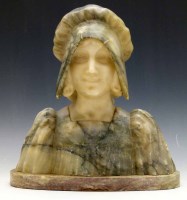 Lot 604 - Marble and alabaster bust of a girl.