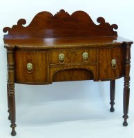 Lot 634 - Early Victorian knee hole sideboard.