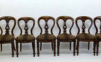 Lot 635 - Twelve mahogany dining chairs.