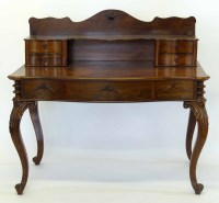 Lot 638 - Rosewood French desk.