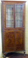 Lot 642 - Walnut corner cupboard.