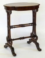 Lot 657 - Victorian walnut shaped table.