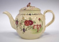 Lot 132 - Cockpitt Hill cream ware teapot.