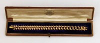 Lot 336 - 15ct flat curb bracelet 24.9g.