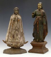 Lot 625 - Two carved and painted colonial religious figures