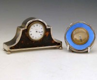 Lot 639 - Silver and enamel cased clock and another (2).