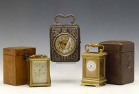 Lot 642 - Miniature brass carraige clock and two others