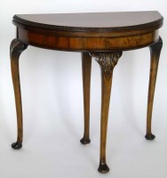 Lot 663 - 1930's walnut foldover card table.