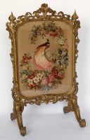 Lot 670 - Fire screen.